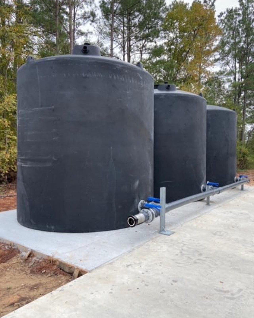 Firewater storage — three 10,000 gallon tanks with manifold